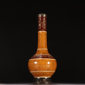 A Qing Dynasty purple gold glazed gold-painted ruyi pattern bottle