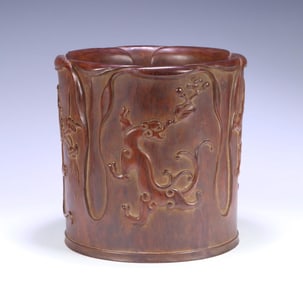 A piece of Qing Dynasty Huanghuali dragon magnolia flower pen holder