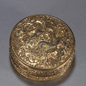 A copper gilt cloud dragon pattern lid box
