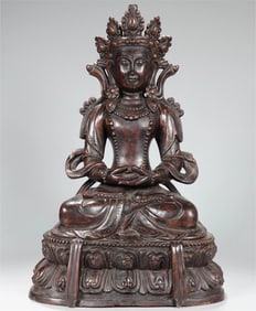 A beautiful agarwood carved Guanyin seated statue