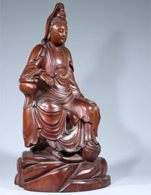 A Qing Dynasty boxwood free Guanyin ornament