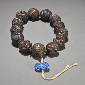 A piece of old agarwood zodiac hand