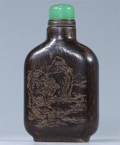 A Qi Nan agarwood landscape poetry snuff bottle of the Qing Dynasty