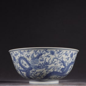A Ming Dynasty Chenghua blue and white dragon wearing a large bowl with floral patterns