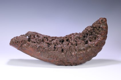 A Qing Dynasty old bamboo carving hollow Eight Immortals boat-shaped ornament
