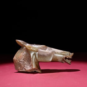 A piece of Hetian jade carved horse head