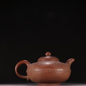 A famous purple sand carved landscape poetry teapot