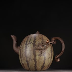 A Wang Yinxian purple sand watermelon teapot