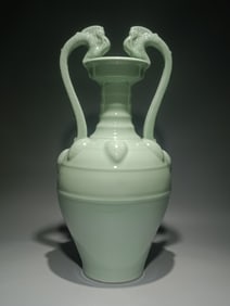 A Qing Yongzheng bean celadon double dragon bottle