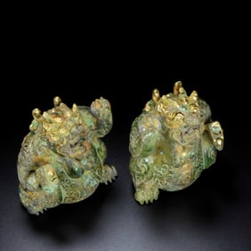 A pair of Hetian jade carved bear ornaments