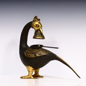 A Qing Dynasty copper phoenix oil lamp ornament