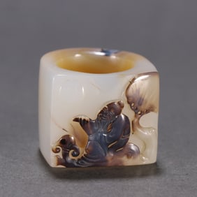 A piece of agate pretty color carved character finger
