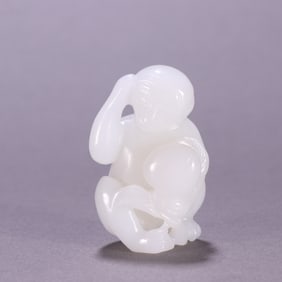 A Qing Dynasty Hetian jade spirit monkey birthday carving