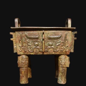 A bronze square tripod
