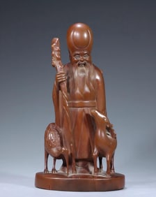 A beautiful boxwood carving birthday ornament