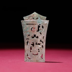 A jade carved dragon sword ornament from the Han Dynasty
