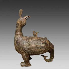 A bronze bird statue