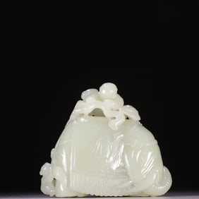 A Qing Dynasty Hetian jade boy elephant carving