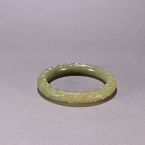 A Qing Dynasty Hetian topaz auspicious cloud pattern bracelet