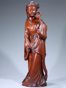 A beautiful boxwood carving lady flower ornament