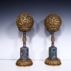 A pair of Qing Dynasty cloisonné dragon and phoenix incense burner ornaments