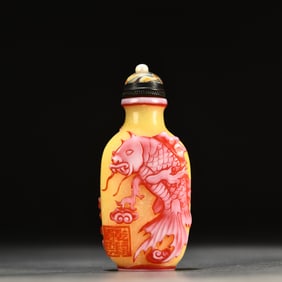 A glass fish turned dragon snuff bottle
