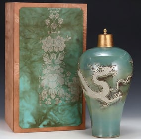 A Yuan green glazed white dragon pattern plum bottle