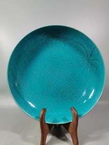 A peacock blue glazed plate from the Qing Dynasty