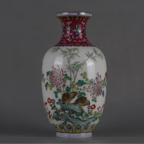 A Qing Qianlong pastel gold-painted flower and bird vase