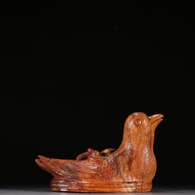 A yellow pear bird ornament