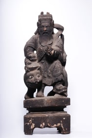 A wooden carving statue of the Medicine King in the Qing Dynasty
