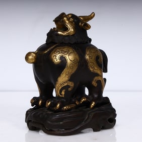 A Qing Dynasty copper unicorn incense burner