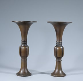 A pair of Qing Dynasty copper flower cups