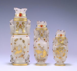 A set of Qing Dynasty Qianlong year Hetian jade wrap gold wrong sterling silver inlaid coral