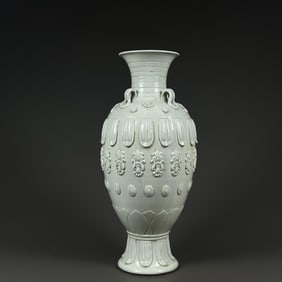 A fixed white kiln lotus pattern vase