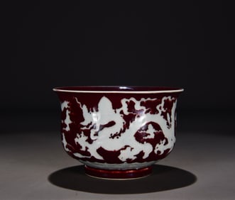 A Ming Xuande Jihong white dragon pattern golden bell bowl