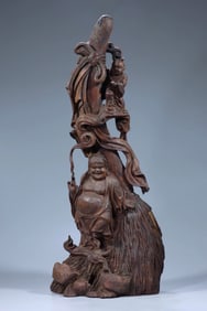 A Qing Dynasty agarwood carved bangs ornament