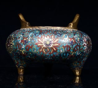 A Qing Dynasty cloisonné three-legged stove