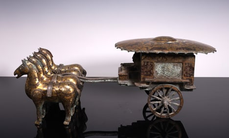 A Han Dynasty copper cuo gold and silver horse-drawn carriage