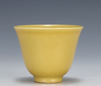 A Ming Dynasty Chenghua yellow glazed bell cup