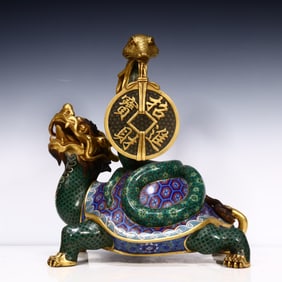 A Qing Dynasty cloisonné basalt ornament