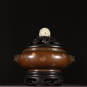 A copper-dotted gold double lion's ear aroma diffuser