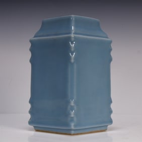A Qing Guangxu blue glaze elephant ear cong-style bottle