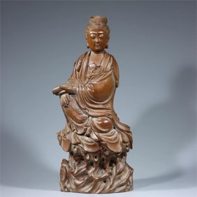 A boxwood sutra holding Guanyin ornament from the Republic of China period