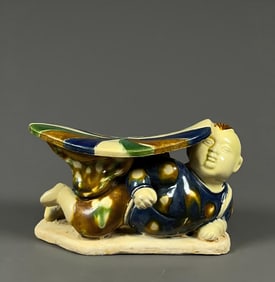A three-colored doll pillow in Tangong County kiln