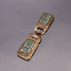 A Qing Dynasty silver-gilt jade belt buckle