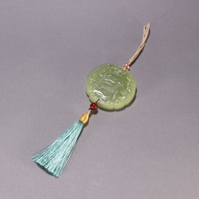 A piece of Qing Dynasty Hetian topaz Taiping has an elephant sachet