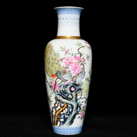 A Qing Yongzheng pastel gold-painted flower and bird pattern Guanyin vase