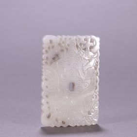 A Qing Dynasty Hetian jade dragon and phoenix card