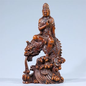 A boxwood of the Qing Dynasty Aolong Guanyin
